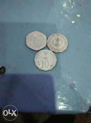 Three Grey Coins