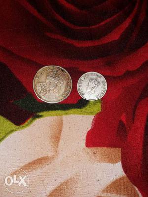Two Silver Man's Profile Coins