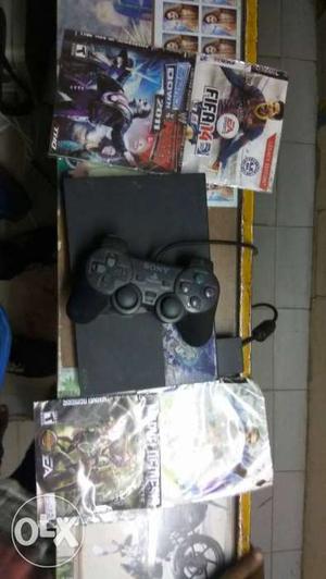 Black Sony PS2 Game Set