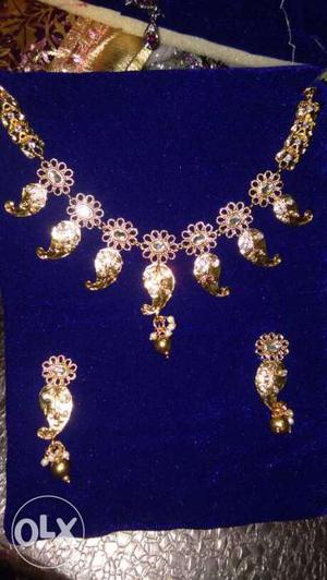 Gold Floral Necklace And Pendant Earrings Set