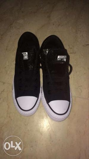Pair Of Black-and-white Converse Low Top Sneakers
