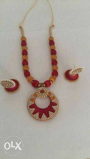 Pair Of Red-and-gold Jhumka Earrings And Necklace Jewelry