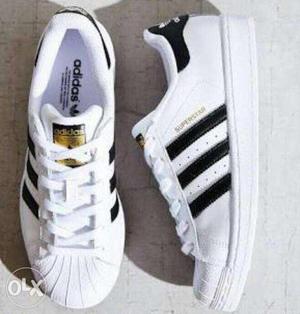 Pair Of White-and-black Adidas Superstar Shoes
