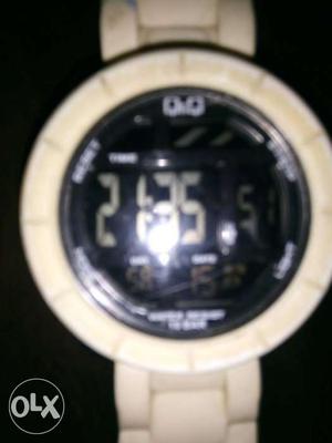 Round Black Face Digital Watch With White Link Strap