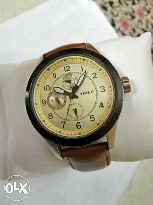 Round Black Timex Chronograph Watch With Brown Leather Band