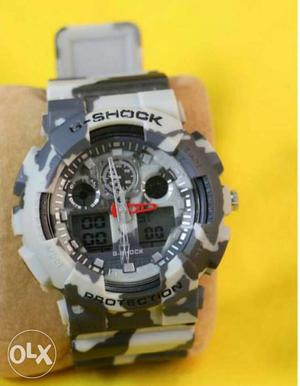 Round Gray And White G-Shock Digital Watch With Gray
