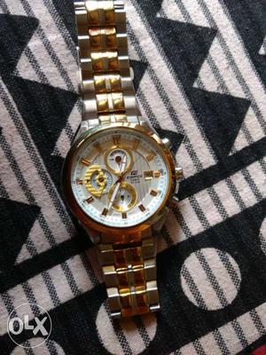 Round Silver And Gold Chronograph Watch With Chain Link