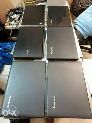 Six Black Laptop Computers