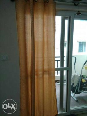 2 pieces of Door curtains in peach colour. Length