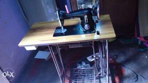 Black And Beige Treadle Sewing Machine
