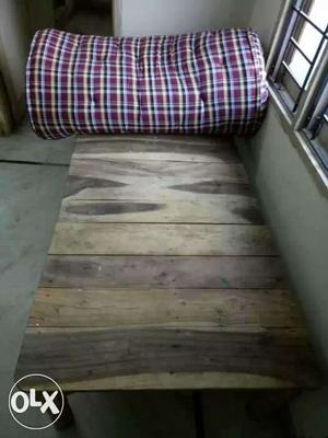 Brown Wooden Plank Bed
