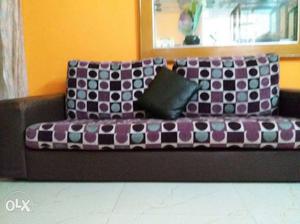 Grey, maroon And purple Couch