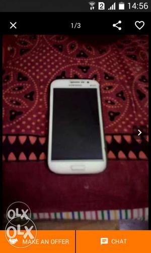 Samsung galaxy grand neo plus phone and charger