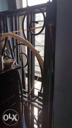 Unused queen-sized wrought iron bed for sale