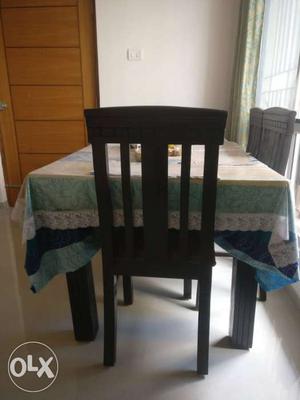 Wooden Dining Table with 4 chairs. Purchased 1.5