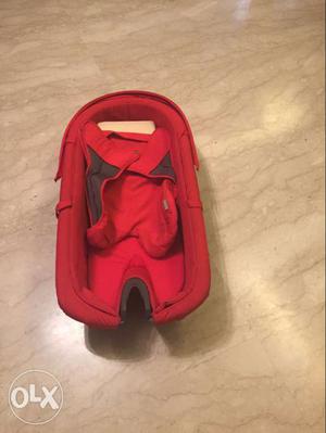 Baby's Red Car Seat Carrier