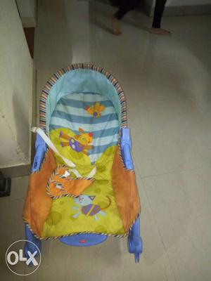 Baby's Yellow,brown And Blue Deluxe Bouncer