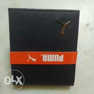 Black Puma Leather Bi-fold Wallet