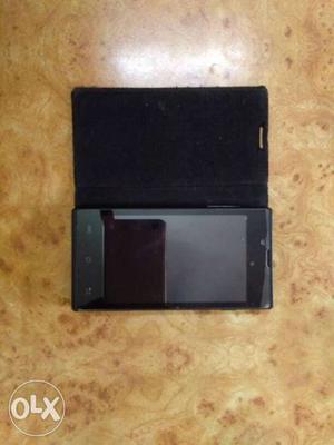 Black colour phone with screen gaurd nd black