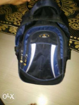 Blue, Black, And White Backpack