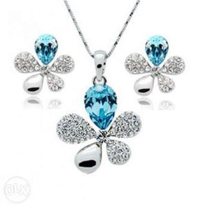 Blue Topaz And Silver Floral Pendant And Necklace