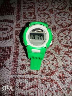 Gray Faced Digital Watch With Green Straps