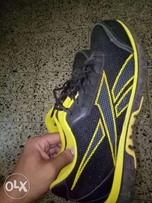 Pair Of Black-and-yellow Reebok Sneakers