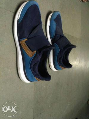 Pair Of Blue Strap Sneakers