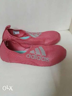 Pair Of Red Adidas Slip Ons Shoes
