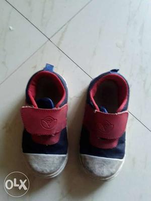 Pair Of Toddler's Red And Black Shoes