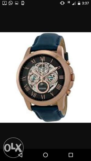 Round Black And Gold Fossil Chronograph Watch With Black