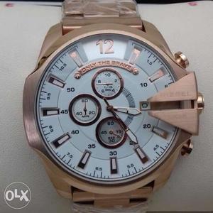 Round Gold And White Chronograph Watch