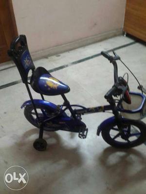 Toddler's Blue Bicycle With Trainer Wheels