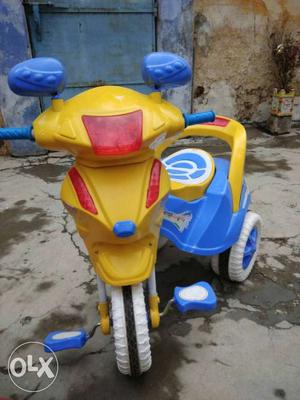 Toddler's Yellow And Blue Pedal Triker