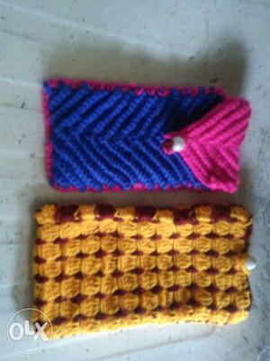 Two Blue And Yellow Knitted Wallets