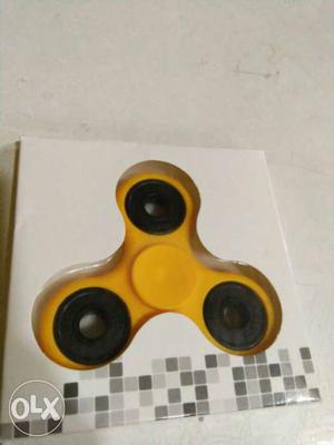 Yellow Three-bladed Fidget Spinner In Pack