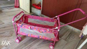 A baby cradle in good condition for sale