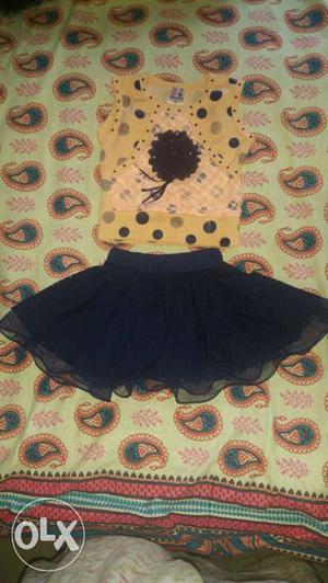 Baby girl's skirt and top. New. Suitable for 6-12