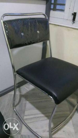 Black And Gray Steel Chairs - 20 to 30 Slightly negotiable.