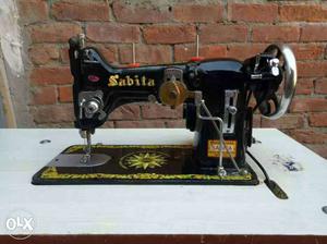 Black And Yellow Sabita Sewing Machine