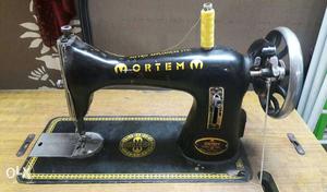 Black Ortem Sewing Machine