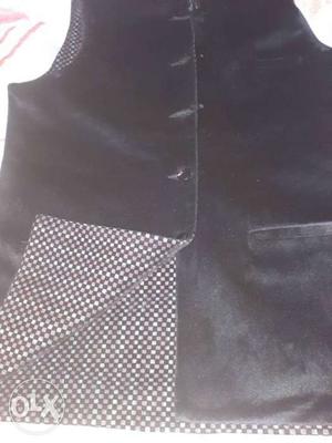 Black velvet waistcoat in good condition