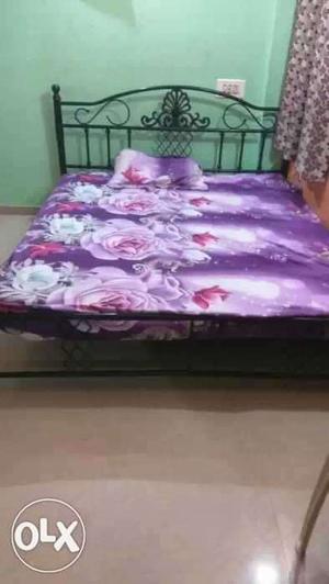 Foldable king size iron bed in solid condition