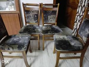 Four Brown Wooden Framed Black-and-gray Cotton Padded Chairs