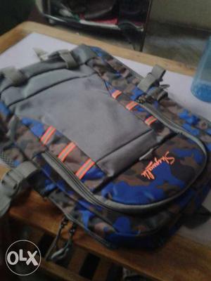 Gray And Orange Backpack 2 days old not used