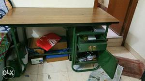 Metal table with wood top and 2 draw racks.. negotiable