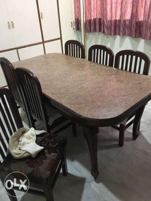 Rectangular Brown Granite Top Table And Six Chairs