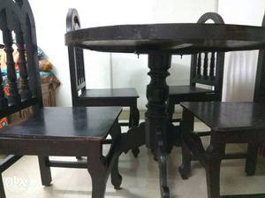 Rose wood dining table with 4 çhairs.