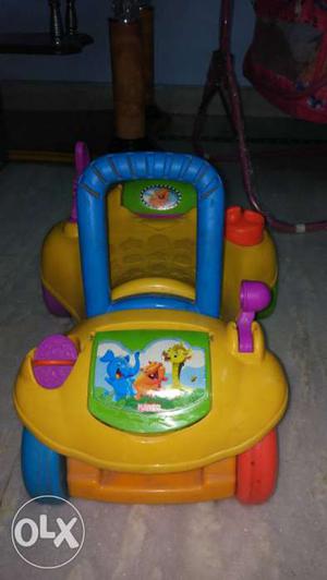 Toddler's Yellow, Blue, And Purple Ride-on Toy
