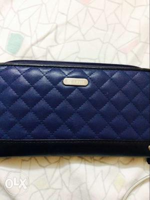 A royal blue and black wallet from Lavie brand to